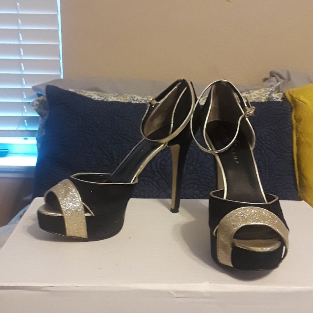 Black and gold heels